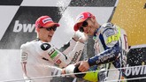 Jorge Lorenzo menjadi pesaing utama Valentino Rossi di MotoGP 2010. (Photo by FRANCISCO LEONG / AFP)