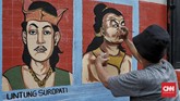 Dinding-dinding di gang-gang dihiasi mural di Pademangan Timur, Jakarta, Senin (18/11/2019). (CNN Indonesia/Andry Novelino)