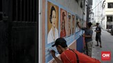 Mural dibuat oleh warga setempat untuk memberi edukasi kepada anak-anak usia sekolah yang tinggal di kawasan itu. (CNN Indonesia/Andry Novelino)