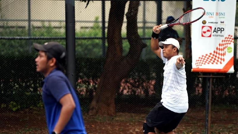 Aksi Ganda putra bersaudara unggulan Pelatnas David Agung Susanto dan Anthony Susanto memenangkan pertandingan final BNI Tennis Open 2019
