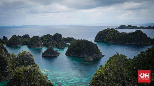 Foto Melihat Lebih Dekat Keindahan Bukit Pianemo