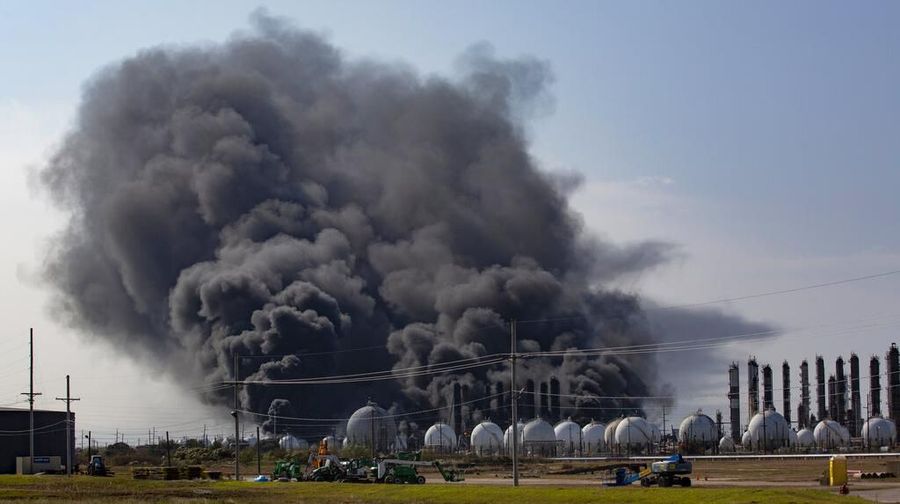 Smoke rises from an explosion at the TPC Group Port Neches Operations plant on Wednesday, Nov. 27, 2019, in Port Neches, Texas. (Marie D. De Jesus/Houston Chronicle via AP)