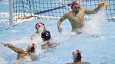 Tim Merah Putih meraih kemenangan mutlak melawan Malaysia. Unggul 4-0 pada babak pertama, Rezza Putra dan kawan-kawan meraih kemenangan 14-7. (AP Photo/Aaron Favila)