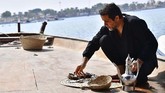 Bulan lalu, otoritas Abu Dhabi mengumumkan bahwa mutiara alami tertua di dunia ditemukan di Pulau Marawah. Mutiara kuno itu akan ditampilkan untuk pertama kalinya di Louvre Abu Dhabi. (GIUSEPPE CACACE / AFP)