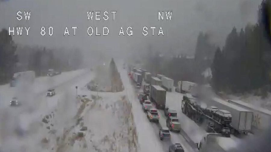 In this still image taken from a Caltrans remote video traffic camera, traffic is stopped along Interstate 80 because of multiple spinouts, Tuesday, Nov. 26, 2019, in Truckee, Calif. Northern California and southern Oregon residents are bracing for a