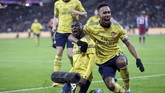 Setelah Gabriel Martinelli menyamakan kedudukan di menit ke-60, Nicolas Pepe berhasil membawa Arsenal berbalik unggul 2-1. (AP Photo/Kirsty Wigglesworth)