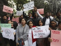 People from northeastern Indian states shout slogans against the government during a protest against Citizenship Amendment Bill (CAB), in New Delhi, India, Wednesday, Dec. 11, 2019. Protesters have burned tires and blocked highways and rail tracks in