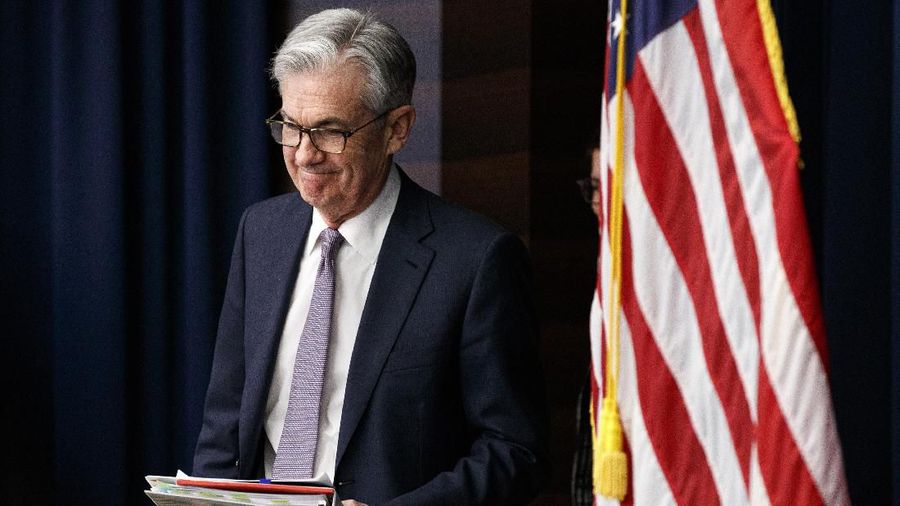 Federal Reserve Chair Jerome Powell arrives to speak at a news conference after the Federal Open Market Committee meeting, Wednesday, Dec. 11, 2019, in Washington. The Federal Reserve is leaving its benchmark interest rate alone and signaling that it expects to keep low rates unchanged through next year. (AP Photo/Jacquelyn Martin)