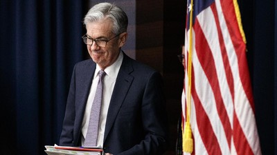 Federal Reserve Chair Jerome Powell arrives to speak at a news conference after the Federal Open Market Committee meeting, Wednesday, Dec. 11, 2019, in Washington. The Federal Reserve is leaving its benchmark interest rate alone and signaling that it expects to keep low rates unchanged through next year. (AP Photo/Jacquelyn Martin)