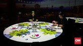 Pengalaman baru menikmati makan di area virtual dining di Trans Studio Bali ditemani instrumen musik Bali selama 15 menit. (CNNIndonesia/Safir Makki)