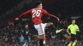 Kemenangan atas AZ membuat Manchester United lolos ke babak 32 besar Liga Europa sebagai juara Grup L. (Lindsey Parnaby / AFP)