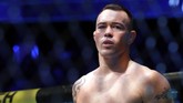 Colby Covington bersiap jelang pertarungan melawan Kamaru Usman. Covington mendapat sambutan negatif dari penonton di T-Mobile sebelum masuk octagon. (Steve Marcus/Getty Images/AFP)