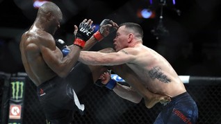 FOTO: Kamaru Usman Hajar Covington Hingga TKO di UFC 245