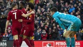 Liverpool melanjutkan tren kemenangan di Liga Inggris usai mengalahkan Watford 2-0 di Stadion Anfield, Sabtu (14/12). Dengan kemenangan itu The Reds menang dalam delapan laga beruntun di Liga Inggris. (AP Photo/Rui Vieira)