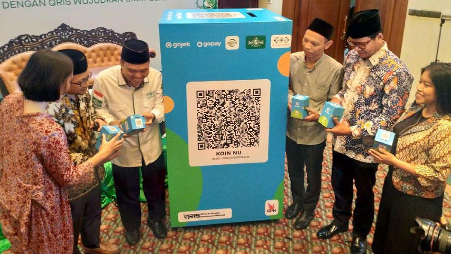 Nahdlatul Ulama secara resmi menggandeng GoPay untuk mengimplementasikan QRIS dalam gerakan Kotak Infaq Nahdlatul Ulama (KOIN NU).