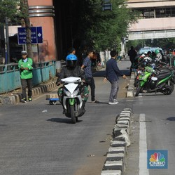 Mega Merger Grab & Gojek Rugikan Konsumen!