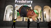 Proses pemakzulan Trump melalui jalang yang panjang dan berbelit, setelah melewati beberapa kali voting komite dan dewan. (Photo by Robyn Beck / AFP)