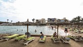 Kini manusia memproduksi lebih dari 300 juta ton plastik setiap tahunnya. (Mohamed el-Shahed / AFP)