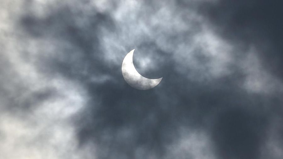 A partial solar eclipse is seen from Jakarta, Indonesia Thursday, Dec. 26, 2019. (AP Photo/Tatan Syuflana)