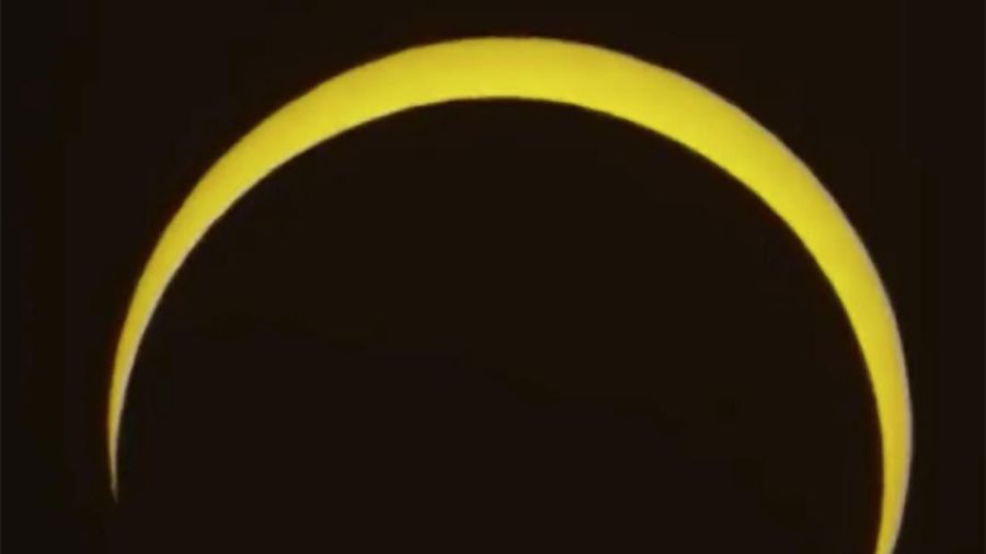 In this image made from live video from Slooh robotic telescope service, shows a near full solar eclipse at the International Astronomical Center, Thursday, Dec. 26, 2019, in Abu Dhabi, United Arab Emirates. (Slooh via AP)