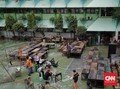 FOTO: Membersihkan Sisa Banjir di SMA Negeri 8 Jakarta