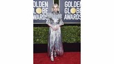 Ingat dongeng Wizard of Oz? Lucy Boynton tampil seperti salah satu karakter dalam dongeng dengan gaun silver berkilau. (Photo by Jordan Strauss/Invision/AP)