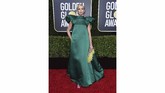Kesan mewah memang didapat Jodie Comer lewat gaun emerald dari Mary Katrantzou ini. Hanya saja, dia tampak seperti tercekik dengan model leher yang tinggi. (Photo by Jordan Strauss/Invision/AP)