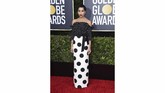 Zoe Kravitz tampil ceria dengan busana serba polkadot. Pemain Fantastic Beats ini mengenakan busana bermotif polkadot rancangan Saint Laurent. Tampilan itu dipercantik dengan kehadiran pita hitam yang ditalikan di bagian pinggang. (Photo by Jordan Strauss/Invision/AP)