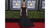 Jennifer Aniston tampil sederhana dan cantik dalam balutan gaun strapless berwarna hitam rancangan Dior. Tak ada detail dan aksosori berlebihan yang dikenakannya. (Photo by Jordan Strauss/Invision/AP)