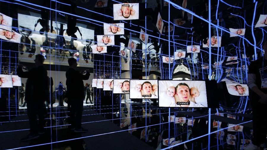 Samsung Sero TVs are on display at the Samsung booth during the CES tech show, Tuesday, Jan. 7, 2020, in Las Vegas. The TVs can rotate to play vertically or horizontally. (AP Photo/John Locher)