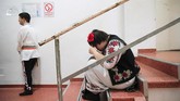 Selama era komunis di Romania, anak-anak dengan down syndrome kerap dibungkam, dijauhkan dari sekolah dan berbagai interaksi sosial. (AP Photo/Vadim Ghirda)