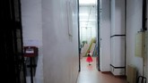 Seorang balerina dari Arabesque Children's Ballet Ensemble tertangkap kamera tengah menunggu giliran tampil di belakang panggung. (AP Photo/Vadim Ghirda)