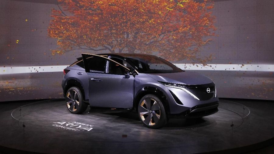 The Ariya Concept electric SUV is on display in the Nissan booth at the CES tech show, Wednesday, Jan. 8, 2020, in Las Vegas. (AP Photo/John Locher)