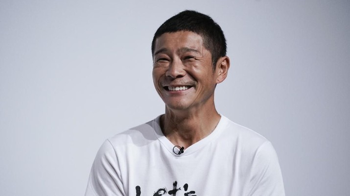 Zozo founder Yusaku Maezawa attends a news conference Thursday, Sept. 12, 2019, in Tokyo. Yahoo Japan Corp. said Thursday, Sept. 12, 2019 it will put up a tender offer, estimated at 400 billion yen ($3.7 billion), for Zozo Inc., a Japanese online retailer started by a celebrity tycoon. (AP Photo/Jae C. Hong)