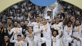 Zinedine Zidane melanjutkan catatan rekor sempurna dengan kemenangan di Piala Super Spanyol. Zidane kini berhasil memenangkan sembilan final yang ia mainkan sebagai pelatih. (AP Photo/Hassan Ammar)