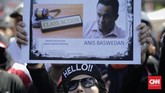 Massa Jakarta Bergerak menuntut Anies Baswedan mundur dari jabatan Gubernur DKI Jakarta.