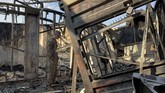 Basis militer Al-Asad berada di Provinsi Anbar barat sekitar 180 kilometer barat Baghdad. Sekitar 1.500 militer AS dan koalisi mendiami lokasi ini bersama militer Irak. (Ayman HENNA / AFP)