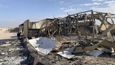 Gedung Putih sudah mendapat peringatan dari intelijen pada Selasa siang menjelang sore bahwa serangan balasan Iran atas kematian perwira tinggi militer Mayor Jenderal Qasem Soleimani. (Ayman HENNA / AFP)