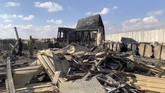 Letnan Kolonel Antoinette Chase mengatakan Iran melancarkan serangan 15 rudal ke basis militer al-Asad selama hampir dua jam. (Ayman HENNA / AFP)