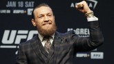 Conor McGregor menunjukkan sikap yang berbeda dalam konferensi pers UFC 246. McGregor lebih kalem dan tidak mengeluarkan kata-kata kotor ke Donald Cerrone. (Kirill KUDRYAVTSEV / AFP)
