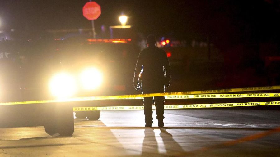 Police investigate after four people were killed and fifth person was injured in a shooting at a Grantsville, Utah, home Friday, Jan. 17, 2020. The suspected shooter was taken into custody by Grantsville police, the Deseret News reported. Grantsville Mayor Brent Marshall said the victims and the shooter are all related, the newspaper reported. (Steve Griffin/The Deseret News via AP)