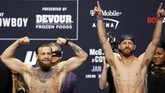 McGregor dan Cerrone tidak memanaskan suasana pertarungan dengan kalimat-kalimat provokatif seperti yang biasa menjadi ciri khas dua petarung. (Steve Marcus/Getty Images/AFP)
