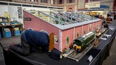Dalam pameran ini, pengunjung diajak untuk menikmati miniatur-miniatur alat transportasi dari masa lalu, kini, dan masa depan. (Photo by Tolga Akmen / AFP)