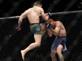 FOTO: Kemenangan TKO 40 Detik McGregor di UFC 246