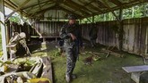 Polisi menangkap 10 orang dan menyelamatkan 15 orang termasuk anak-anak yang diduga akan dikorbankan. (Luis ACOSTA / AFP)