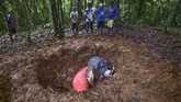 Jaksa penuntut umum mengatakan 10 tersangka kini ditahan setelah terbukti mengikat, memukuli para korban menggunakan Alkitab, tongkat dan parang hingga tewas.(Luis ACOSTA / AFP)