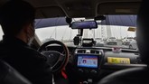 Diduga wabah itu menyeruak dari pasar ikan dan hewan yang terletak di tengah kota Wuhan. (Photo by HECTOR RETAMAL / AFP)
