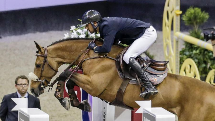 Egypt's Nayel Nassar, riding Lordan, competes in the FEI World Cup equestrian jumping speed class in Omaha, Neb., Thursday, March 30, 2017.