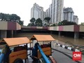 Pagi hingga Petang, Banjir Underpass Kemayoran Belum Surut
