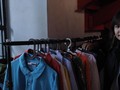 Giat Fania di Antara Tumpukan Baju-baju Bekas